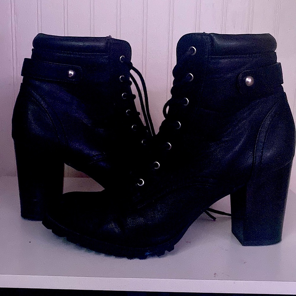Black high heel boots in size 10